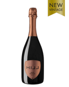 Leo Hillinger HILL Brut Reserve 2017 Schaumwein mit goldener Flasche und Schaumkrone, eleganter Wein für besondere Anlässe